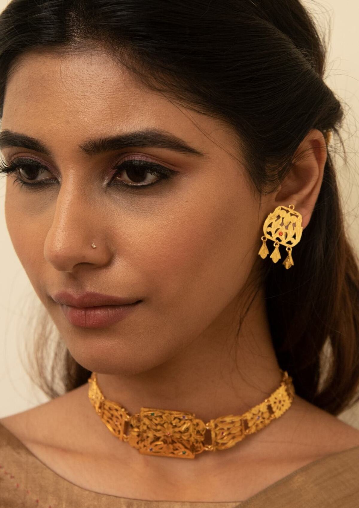 Daasi Gold Tone Silver Necklace