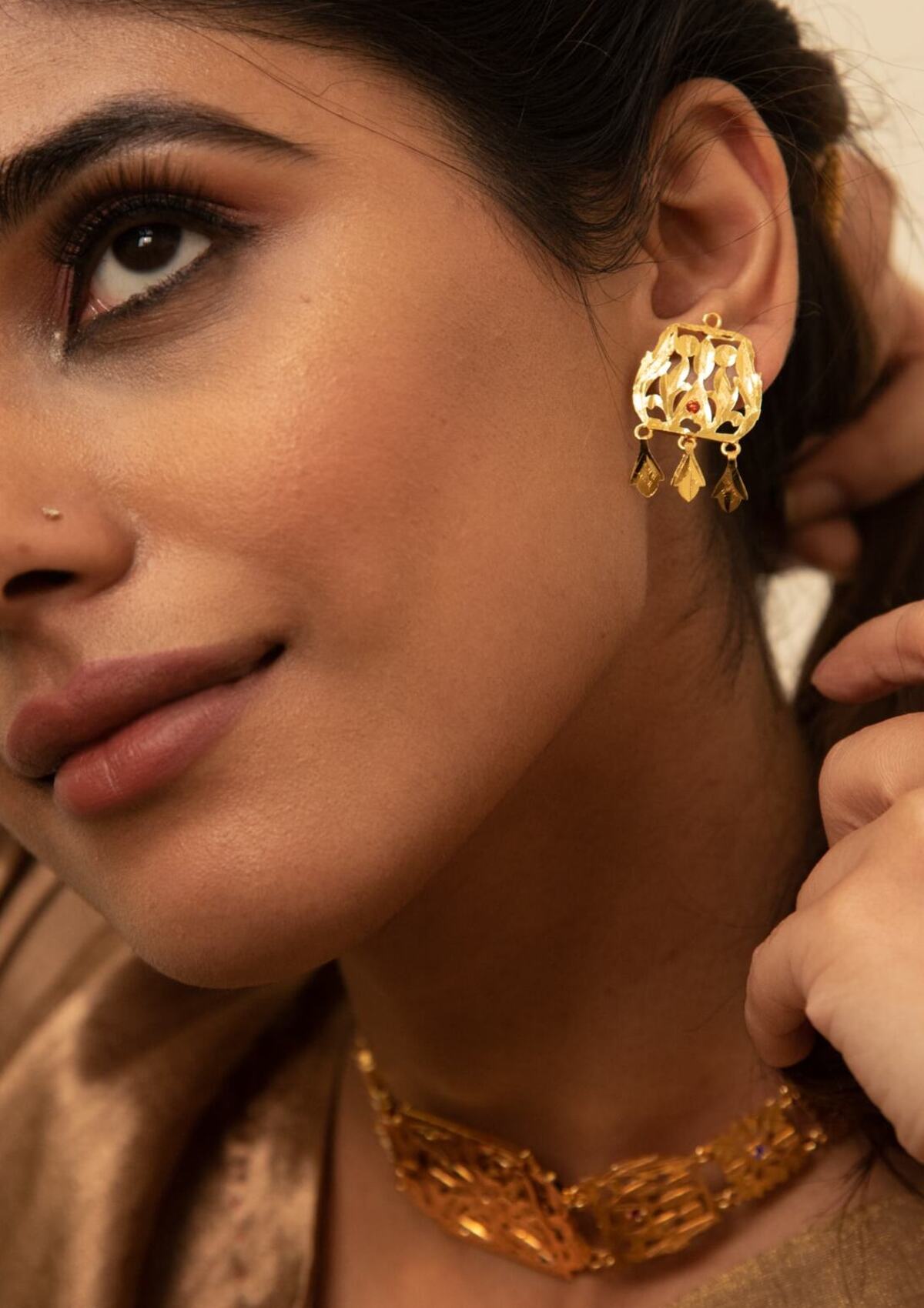 Daasi Gold Tone Silver Necklace