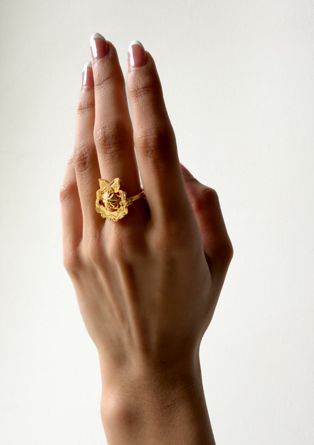 Ojal Gold Tone Silver Ring