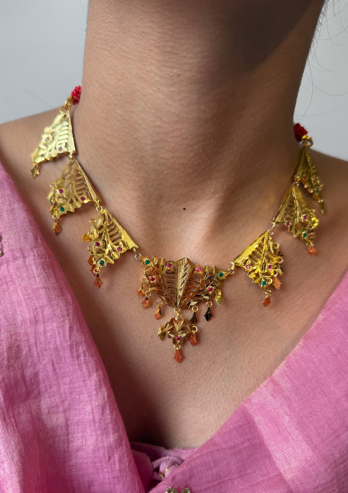 Ambika Gold Tone Silver Necklace