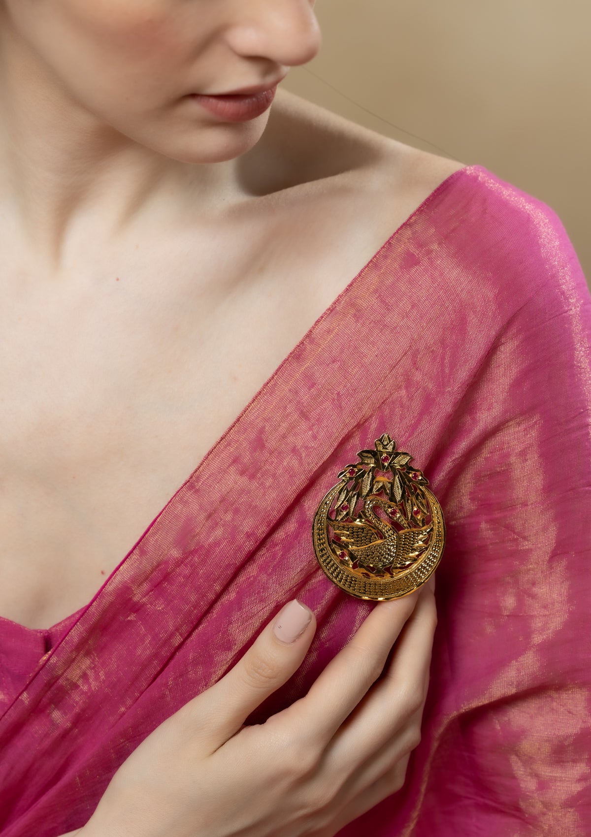 Anika Gold Tone Silver Brooch