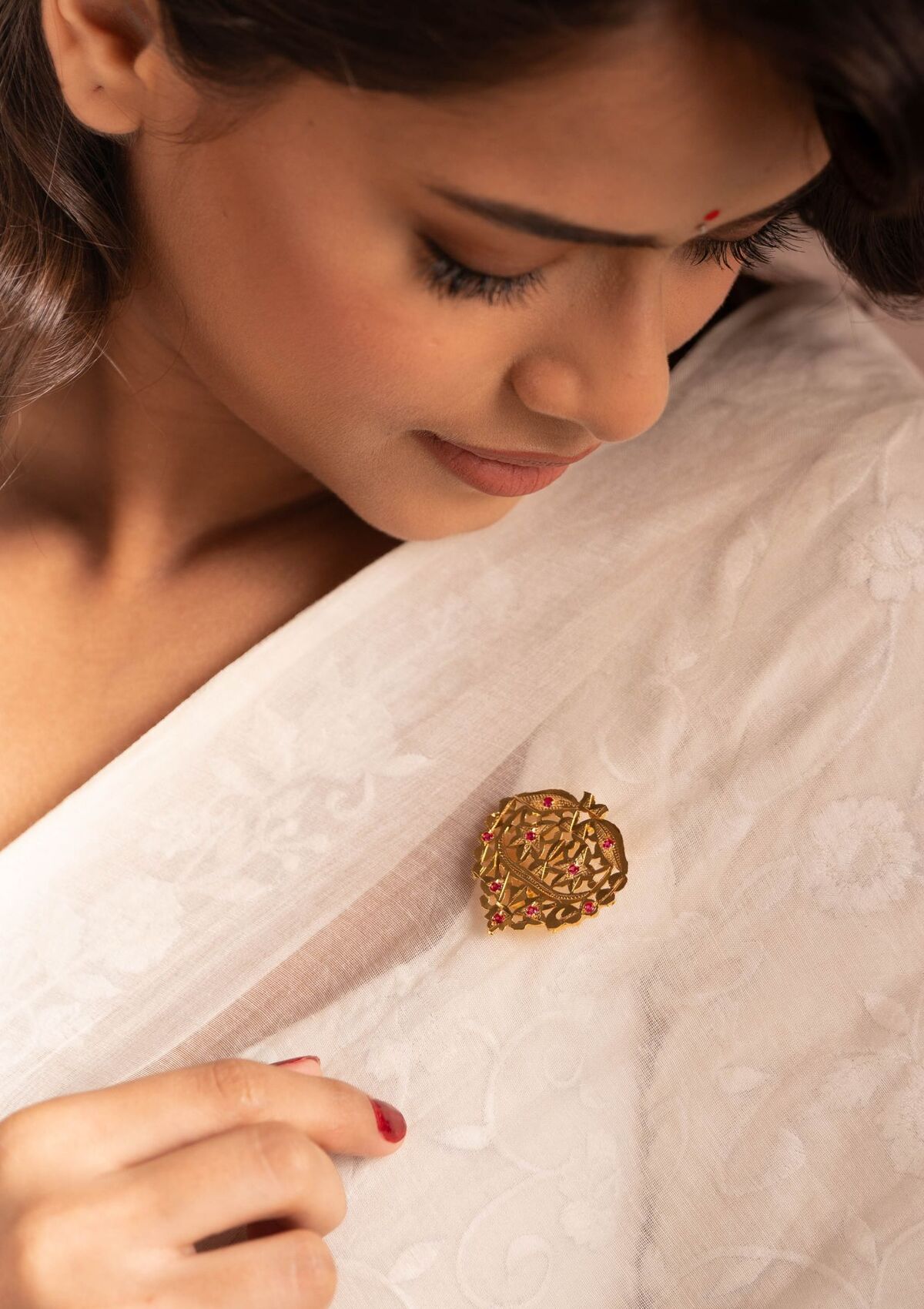 Nima Gold Tone Silver Brooch