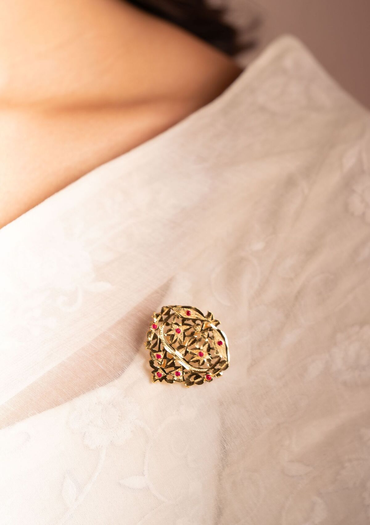 Nima Gold Tone Silver Brooch