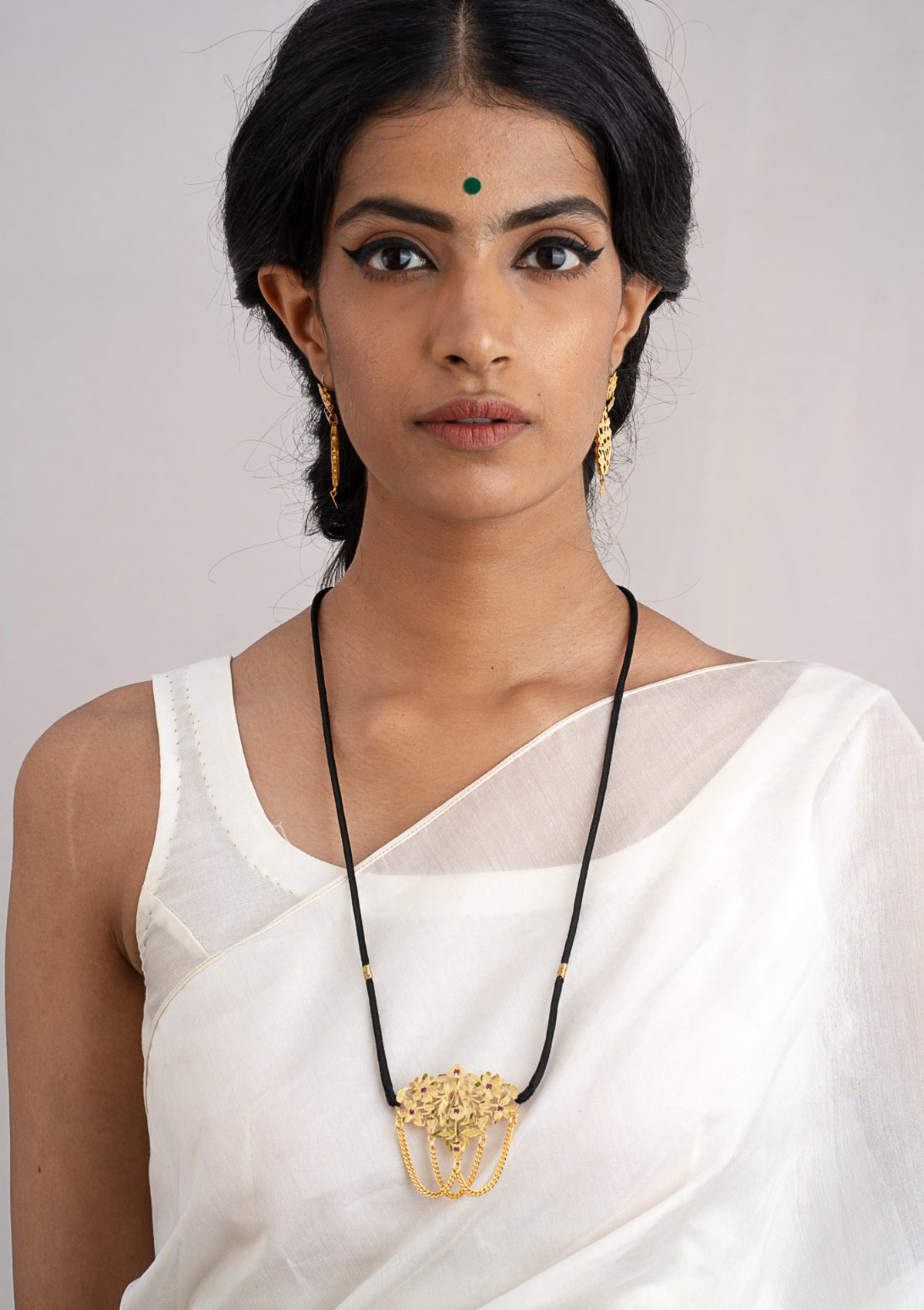 Sakina Gold Tone Silver Necklace