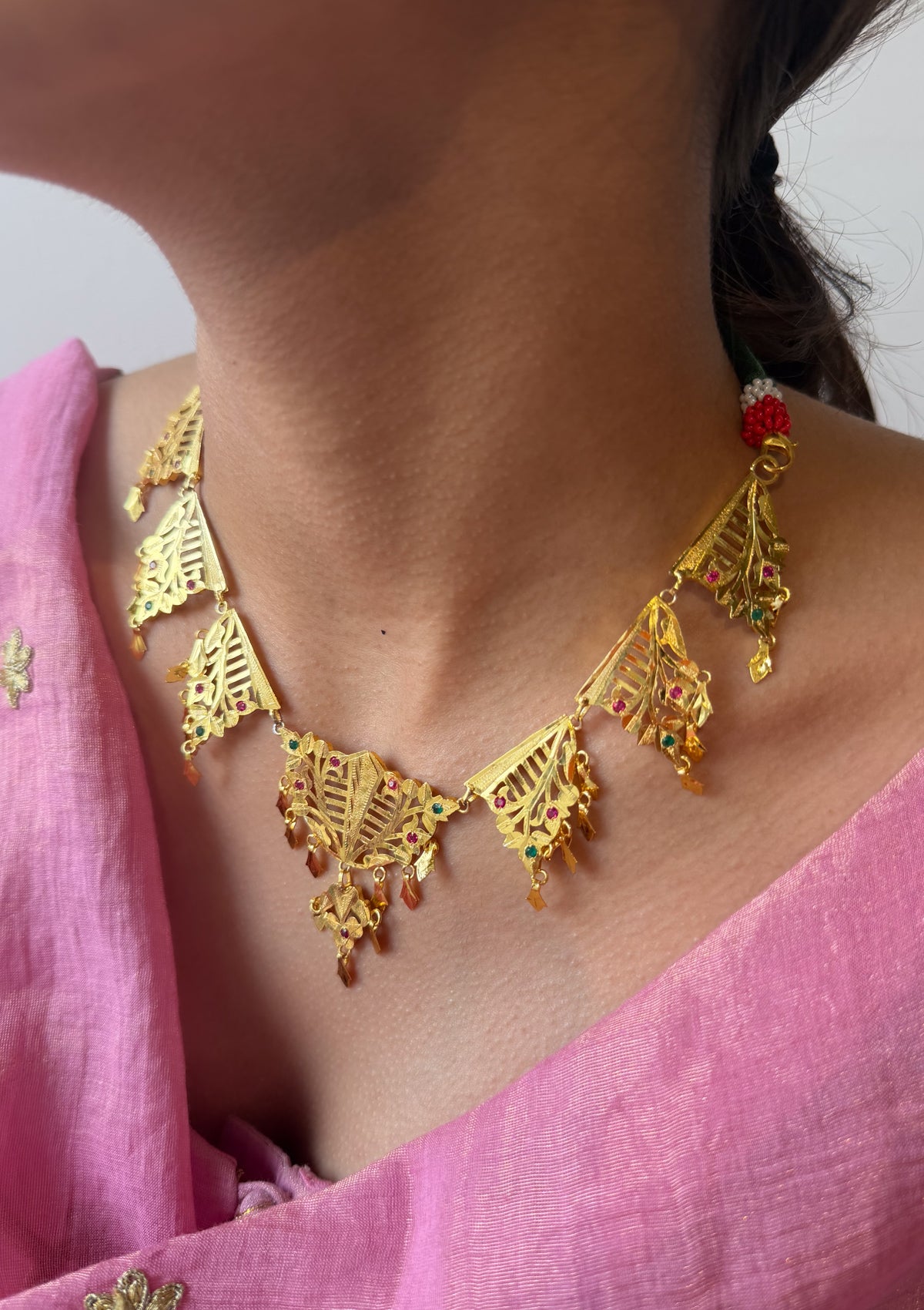 Ambika Gold Tone Silver Necklace