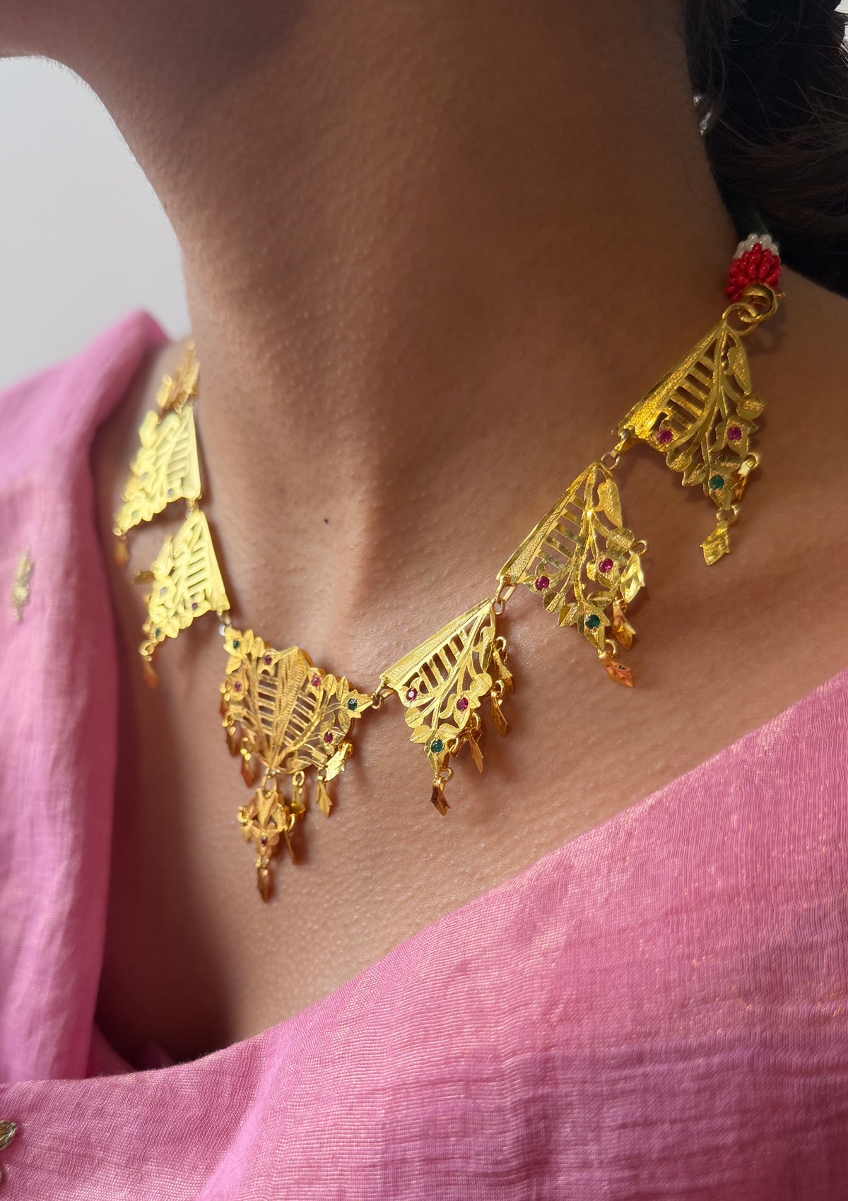 Ambika Gold Tone Silver Necklace