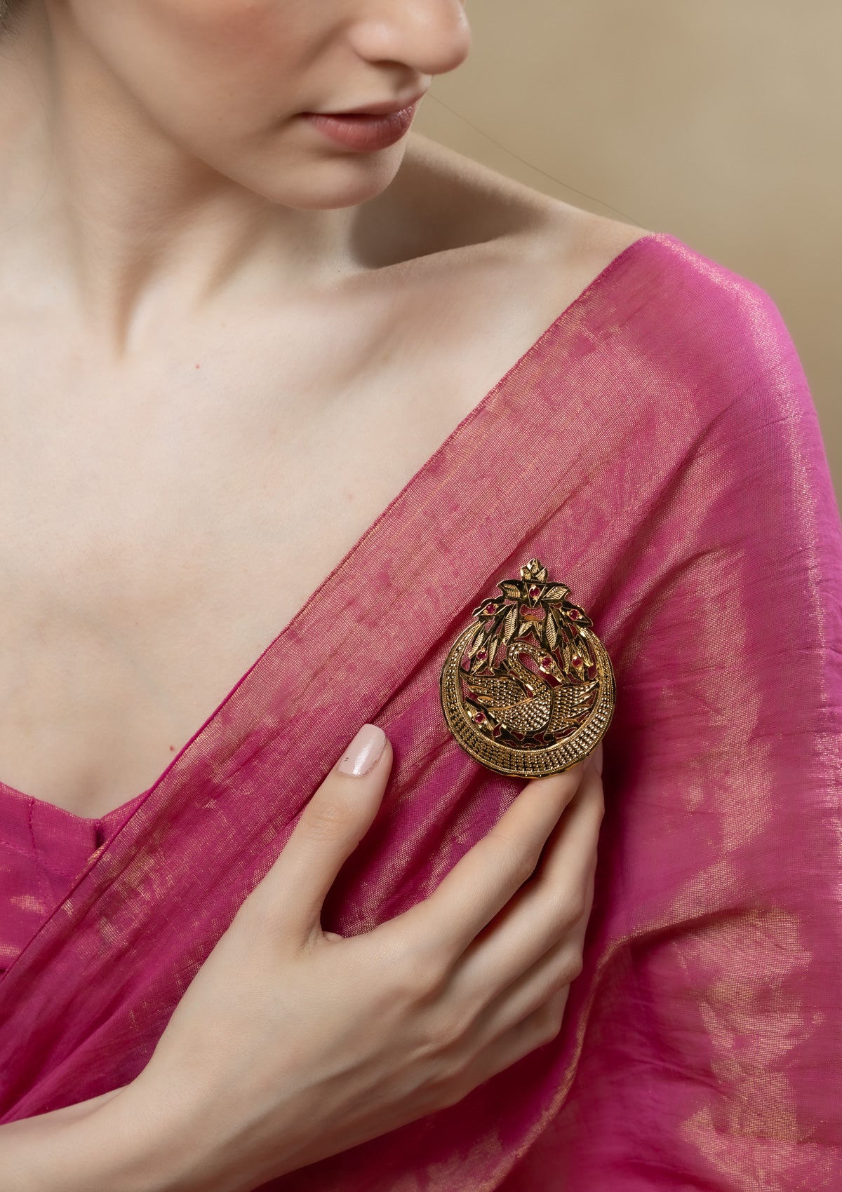 Anika Gold Tone Silver Brooch