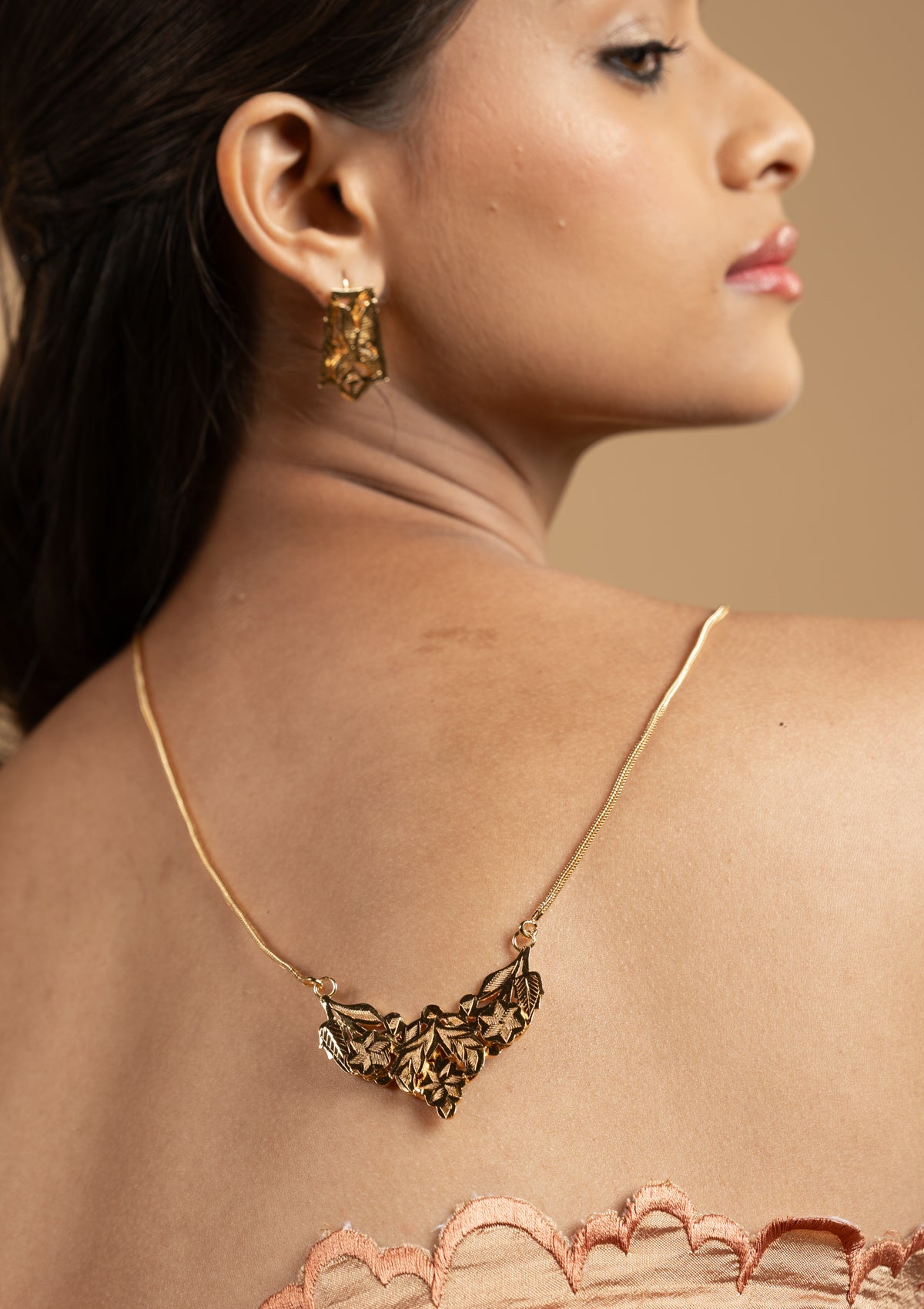 Indu Gold Tone Silver Necklace