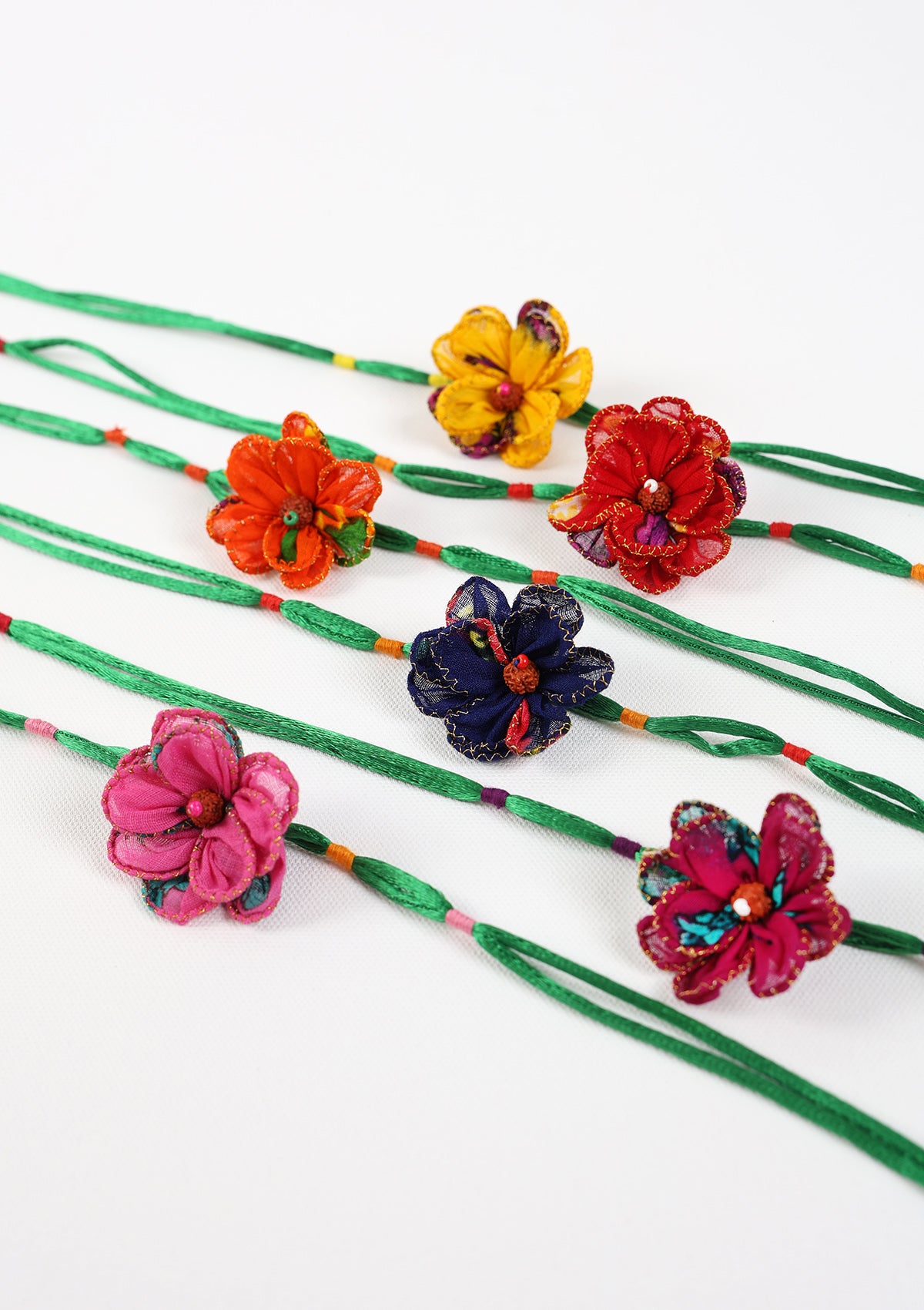 Daisies Textile Rakhi - Set of 6