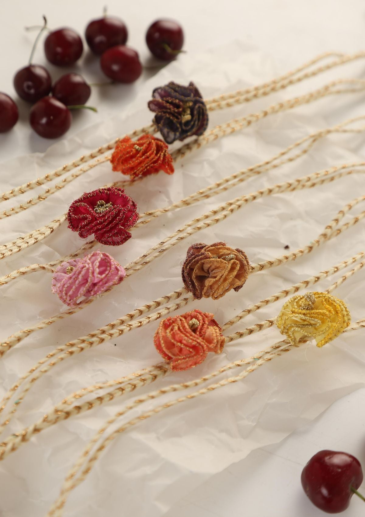 Daisies Textile Rakhi - Set of 7