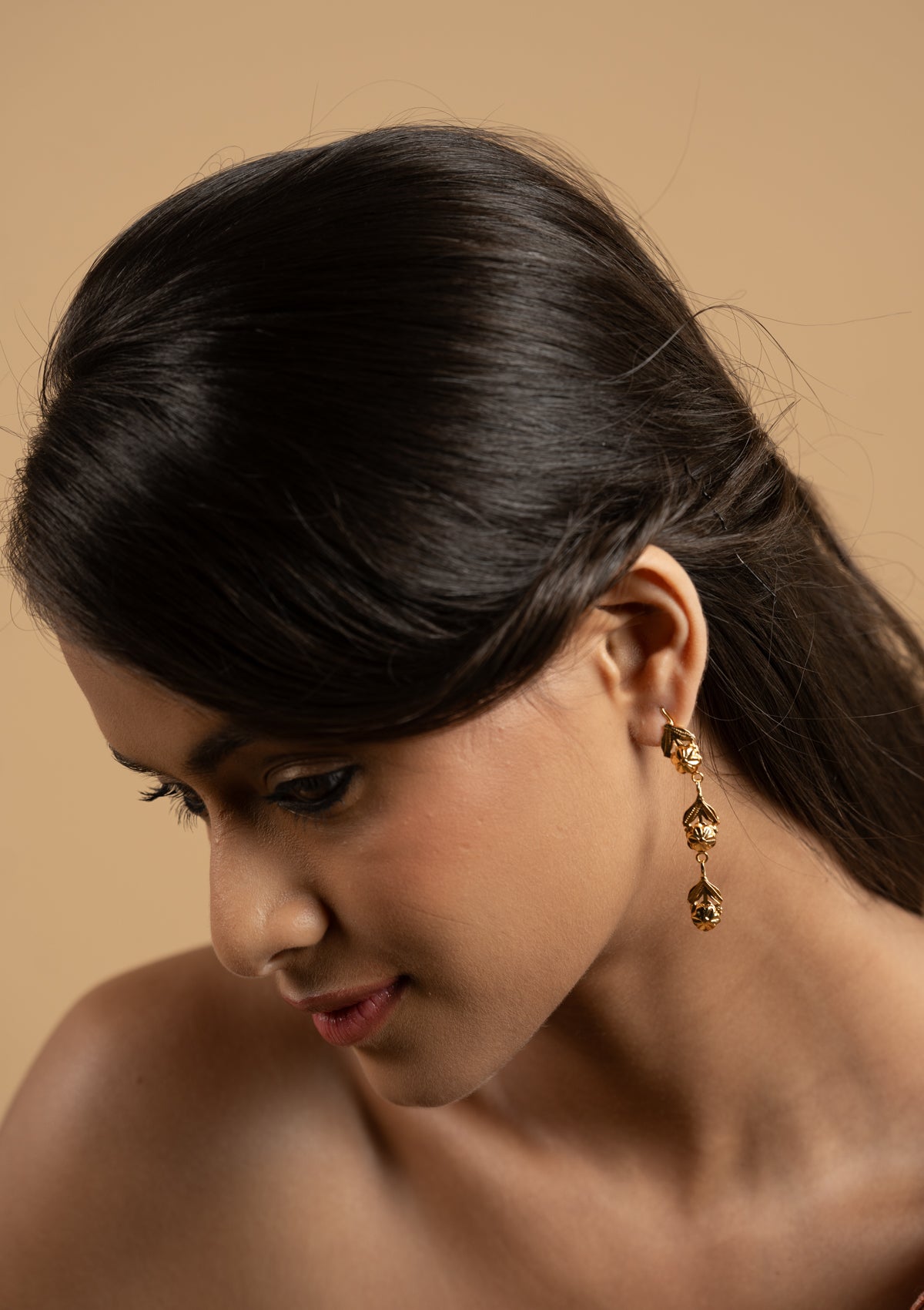 Satya Gold Tone Silver Earrings