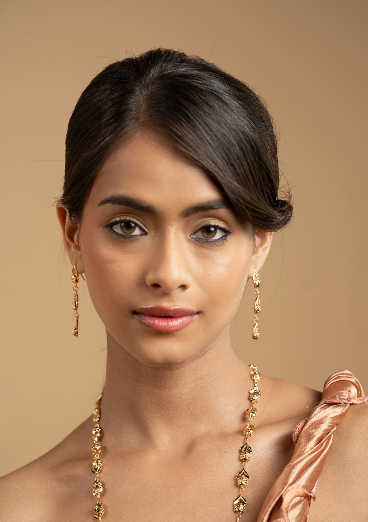 Satya Gold Tone Silver Earrings