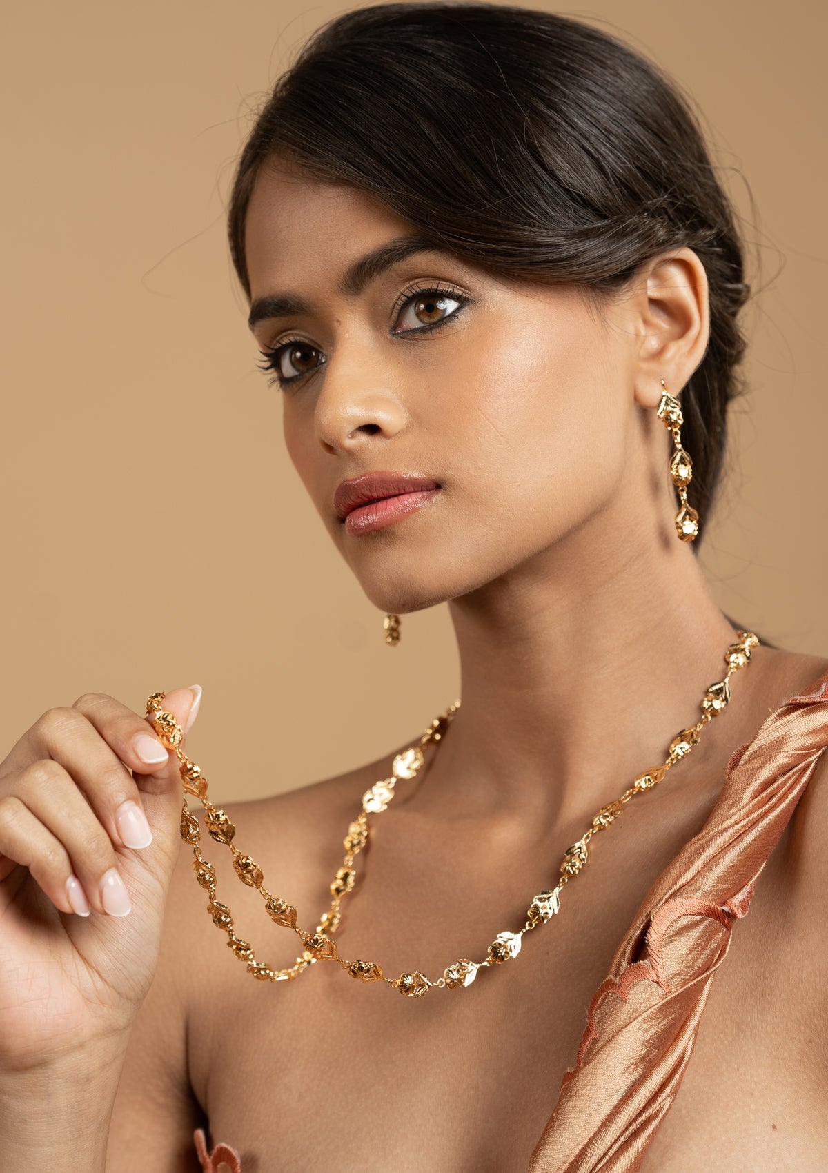 Satya Gold Tone Silver Necklace