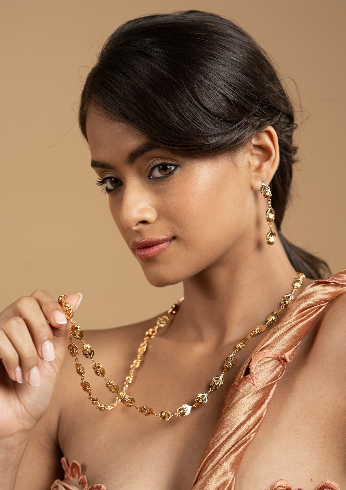 Satya Gold Tone Silver Necklace