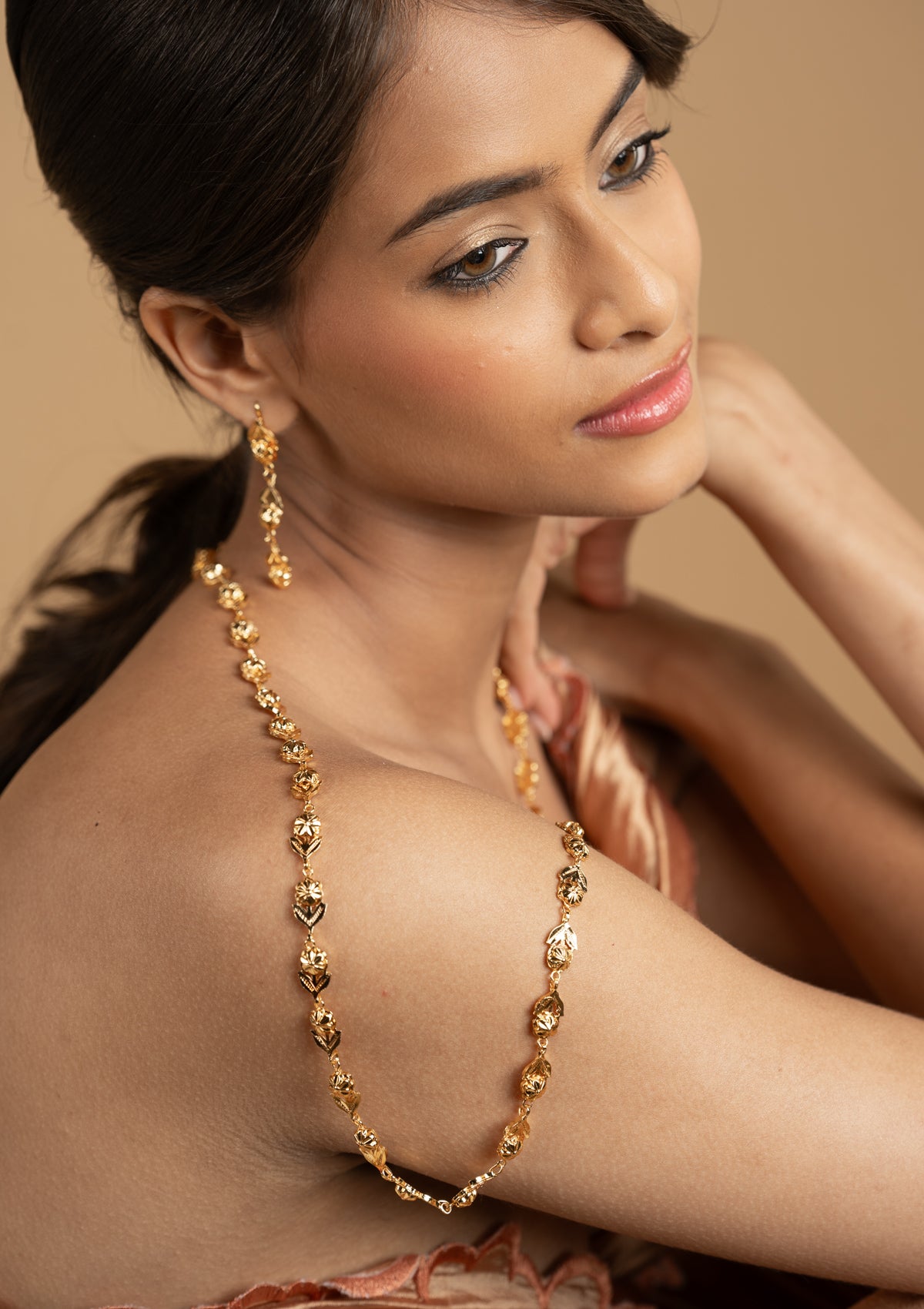 Satya Gold Tone Silver Necklace