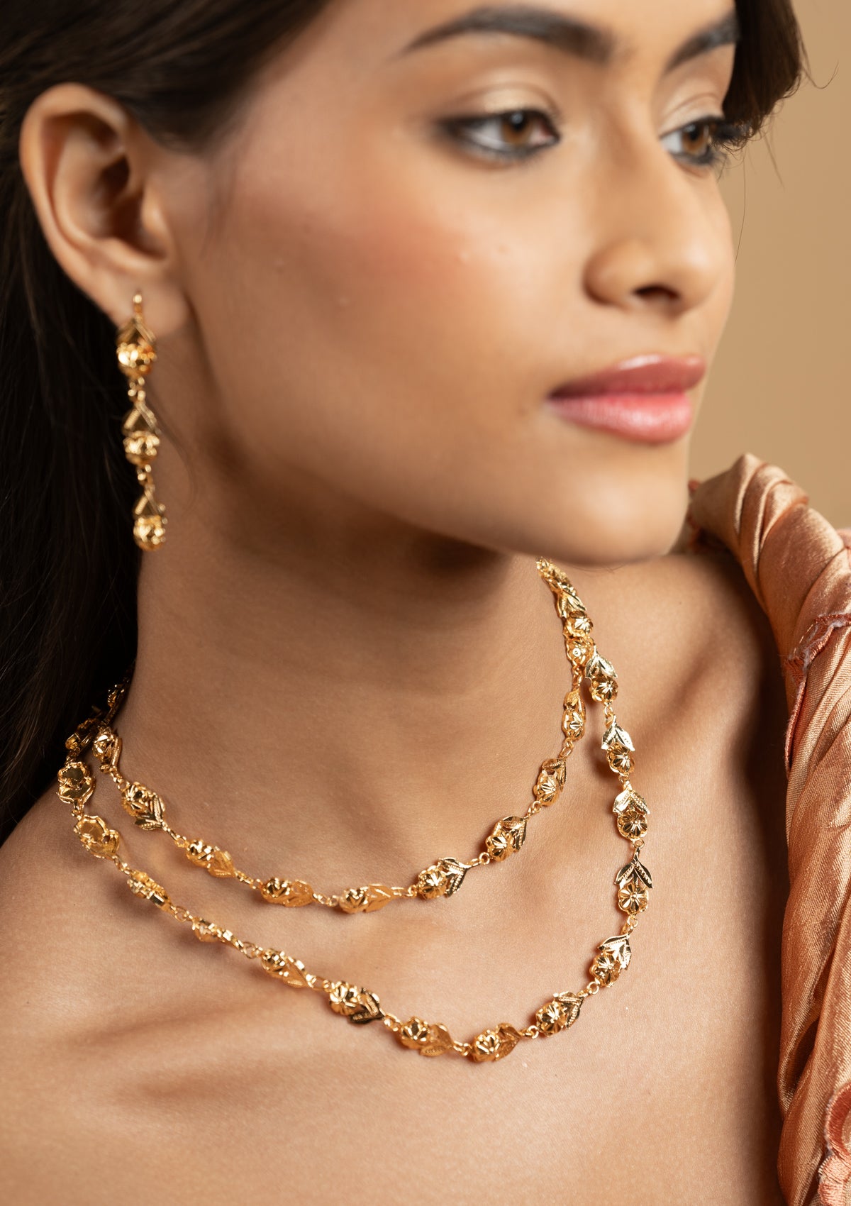 Satya Gold Tone Silver Necklace